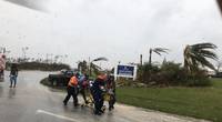 Coast Guard personnel help medevac a patient in the Bahamas during Hurricane Dorian. The Coast Guard is supporting the Bahamian National Emergency Management Agency and the Royal Bahamian Defense Force with hurricane response efforts. (Coast Guard Photo)