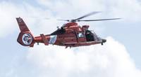 File Image: A USCG rescue copter in the air. (CREDIT: AdobeStock / © Wollwerth Imagery)