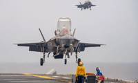 Two F-35B Lightning II fighter aircraft from Marine Fighter Attack Squadron (VMFA) 242, prepare to land on the flight deck of the forward-deployed amphibious assault ship USS America (LHA 6) while conducting flight operations in the Philippine Sea, June 1. America, lead ship of the America Amphibious Ready Group, is operating in the U.S. 7th Fleet area of operations. U.S. 7th Fleet is the U.S. Navy’s largest forward-deployed numbered fleet, and routinely interacts and operates with allies and pa