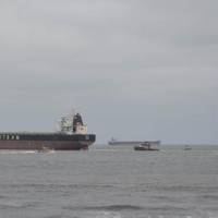 A bulk carrier ship was refloated Friday morning after running aground near Virginia Beach. (USCG photo)