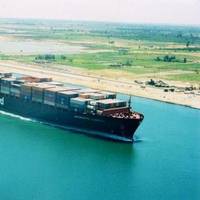 A containership transits the Suez Canal (Photo courtesy of the Suez Canal Authority)