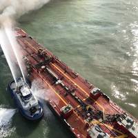A Corpus Christi Fire Department vessel extinguishes a fire on board Buster Bouchard/B. No. 255 approximately three miles from the Port Aransas, Texas, jetties on October 20, 2017. (Photo: U.S. Coast Guard)