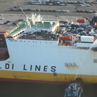A fire boat directing water onto the Grande Costa D’Avorio. (Source: NTSB)