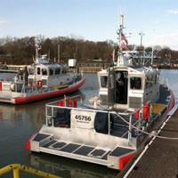 A new 45-foot response boat (right) is moored at Coast Guard Station Marblehead, Ohio, after the station's crew accepted it May 1, 2014. (U.S. Coast Guard photo by Phillip Null)