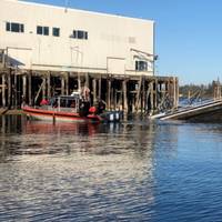 A U.S. Coast Guard boatcrew rescued four people from Darean Rose, a 40-foot commercial fishing vessel that sank in Coos Bay, Ore. (U.S. Coast Guard photo courtesy of Sector North Bend)