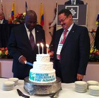  AAPA 100th birthday cake cutting with AAPA Chair Armando Duarte (right) and Immediate Past Chair Jerry Bridges.   Photo/AAPA