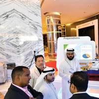 AbdulAziz Somali and Majed Saber from Saudi Aramco’s Marine Department brief visitors. Photo: Saudi Aramco