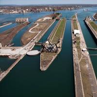 An aerial view from the upper approach to the Soo Locks. The locks from left to right are the Sabin, Davis, Poe and MacArthur. (Image: U.S. Army Corps of Engineers)
