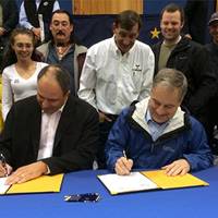 An announcement was made September 20 that Alaska's new ferries will be built in Southeast Alaska. Adam Beck, President of Vigor Alaska and Alaska Governor Parnell sign the agreement. (Photo courtesy Office of the Governor)