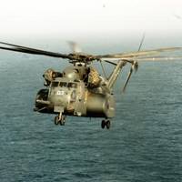 An MH-53E Sea Dragon assigned to Helicopter Mine Countermeasures Squadron 15, launches from the amphibious assault ship USS Peleliu. Peleliu is the flagship for the Peleliu Strike Group and is deployed to the U.S. 5th Fleet area of responsibility to conduct maritime security operations. (A stock photo of a MH-53E Sea Dragon helicopter taken in 2008.)