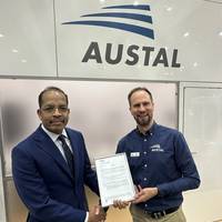 Antony M DSouza, President and Director Southeast Asia, Pacific and Indian Subcontinent, DNV and Sam Abbott, Head of Research and Development at Austal celebrate the Approval in Principle for the AROS Controller at INDO PACIFIC 2025. (image: Austal)