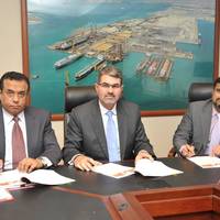 ASRY Chief Executive Nils Kristian Berge (centre) signs deal with Solas Marine Services General Manager Sanjay Prabhu (right)