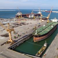 Asyad Dry Dock in Duqm, Oman, was previously Oman Drydock Company. Its new name reflects its ownership by Oman shipping and logistics group, Asyad. Image courtesy Asyad Dry Dock