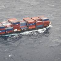 Barge container ship, Columbia Elizabeth, is towed to Port of Palm Beach, Dec. 6, 2015. While enroute to Puerto Rico, several cargo containers fell overboard off the coast of Port Canaveral, Fla. (U.S. Coast Guard photo)