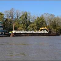 Barge on the Missouri River delivers rock to stabilization areas along the river. (Photo: U.S. Army Corps of Engineers, Kansas City District)
