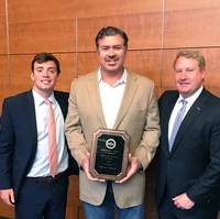 Ben Bordelon, Bollinger President and CEO, accepting the SCA award from Davis Gaddy, SCA Government Relations Coordinator (left) and Matthew Paxton, SCA President (right). (Photo: Bollinger Shipyards)