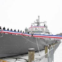 Blue crew of the freedom variant littoral combat ship USS Little Rock (LCS 9) man the rails during the ship's commissioning ceremony Dec. 16, 2017 in Buffalo, N.Y. (U.S. Navy photo courtesy of Lockheed Martin)