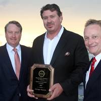 Bollinger president and CEO Ben Bordelon (center) accepting the award from SCA president Matthew Paxton (left) and SCA chairman Richard McCreary (right). (Photo: Bollinger)