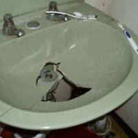 Broken sink as found in the crew accommodations aboard the Panamanian flag buld carrier Pistis.