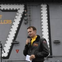 Capt. Brett Crozier addresses crew during an all-hands call on the USS Theodore Roosevelt (CVN 71) flight deck in November 2019. (U.S. Navy photo by Nicholas Huynh) 