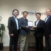 Capt. S.C. Kim, ISS Port Captain for Korean Customers, receiving the award for ‘Best in Vessel Operation’ from Mr. Sang Kim, Director of EUKOR and Head of EUKOR America.
