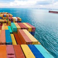 Cargo ships entering one busiest ports in world Singapore Photo OL International Holdings