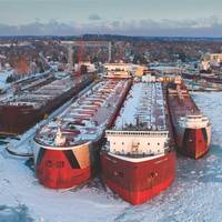 Caring for the Great Lakes fleet: during the winter months is a core business for Bay Shipbuilding Company. Pictured, the 2015 Winter Fleet. (Photo: Bay Shipbuilding)