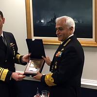 Chief of Naval Operations (CNO) Adm. John Richardson presents a plaque to Indian Navy chief Adm. Sunil Lanba at the Pentagon. (U.S. Navy photo by Nathan Laird)
