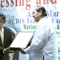 ClassNK Executive Vice President Koichi Fujiwara (left) presenting a certificate to PJMTM President Eduardo U. Manese.