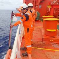 Cleaning of the hull during a voyage using a robotic tool deployed from the deck by the crew. Photo: Shipshave