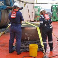 Coast Guard marine safety engineers conduct a survey of the aft titanium endcap from Titan in the North Atlantic Ocean October 1, 2023. (Photo: U.S. National Transportation Safety Board)