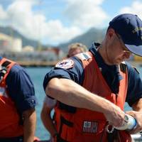 Coast Guard National Strike Force samples water in Honolulu Harbor