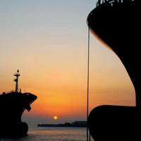 Container ships, sunrise: Photo courtesy of HHI