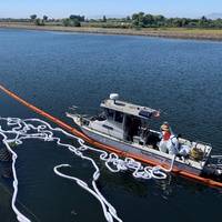 Crews work to place and maintain sorbent boom around the Tug Mazapeta on September 7, 2023. Image credit: California Department of Fish & Wildlife’s Office of Spill Prevention & Response.