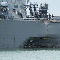 Damage to the portside of guided-missile destroyer USS John S. McCain following a collision with the merchant vessel Alnic MC while underway east of the Straits of Malacca and Singapore (U.S. Navy photo by Joshua Fulton)