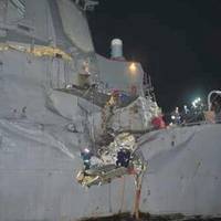 Damaged USS Essex:Photo credit USN