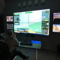 Deck officers Bridget Quinn and Adam Szloch remotely command the autonomous NELLIE BLY in Denmark from Sea Machines’ Boston control room. The SM300 provides the remote commanders with full shore-to-vessel connectivity and control and includes an active chart environment with live augmented data overlays, state of vessel, situational awareness and environmental data, as well as real-time, vessel-born audio and video from many streaming cameras. (Photo: Sea Machines)