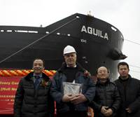 Delivery of M.V. Aquila: Left to right: Mr. Zhuang Tian, LR Surveyor in Charge Nantong; Master - M/V Aquila; Mr. Tae-Bok Kwak, LR Project Manager; Mr. Xiaofeng Yang, LR Site Office Team Leader.