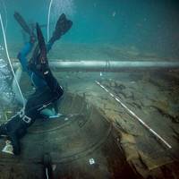 Divers from Valencia University map and assess the state of a 2,500-year-old Phoenician vessel that is submerged 60 meters from the beach of Mazarron, Spain, June 20, 2023. (Photo: Jose A Moya/Regional Government of Murcia)