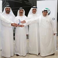 DP World’s Chairman HE Sultan Ahmed Bin Sulayem, Vice Chairman HE Jamal Majid Bin Thaniah, Group CEO Mohammed Sharaf; Senior Vice President and Managing Director of UAE Region, Mohammed Al Muallem, and COO Mohammed Ali Ahmed holding the Award.