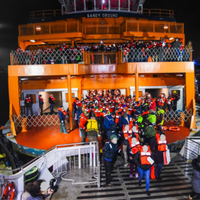 Evacuation of passengers from the Sandy Ground to a responding vessel. (Source: NYCDOT Ferry Division)