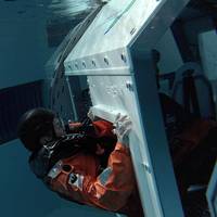 Exiting the helicopter underwater escape trainer. Photo: Deutsche WindGuard