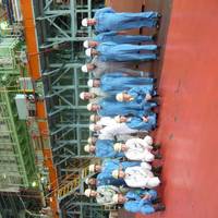FAT attendees pictured in front of the ME-GI engine at MES’s Tamano Works (Photo: MAN Diesel & Turbo)