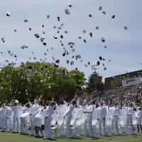 File photo: The cadets of the class of 2019 throws their covers into the air as they officially become ensigns during the 138th commencement exercises at the U.S. Coast Guard Academy in New London, Conn., May 22, 2019. (U.S. Coast Guard photo by Matthew Thieme)