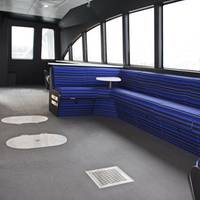 Flush mounted watertight hatches and deck drains promote accessibility and can be submitted to the Coast Guard as an alternative to six-inch door coamings. (Image courtesy All American Marine)