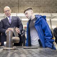 FM John Swinney and ETZ Ltd Chairman Sir Ian Wood are shown the skills hub welding facilities (Credit: ETZ)