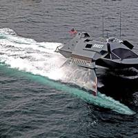 Ghost, a high-speed stealth boat that was nearly cancelled, has been resurrected.  The low-observable Ghost is a SWATH (small waterplane area twin hull) vessel with a speed of up to 35 knots and a very shallow draft.   General Dynamics Mission Systems has teamed with Juliet Marine Systems to make Ghost configurable as a manned, remote control, and unmanned platform and to integrate the modular payload capability for a broad spectrum of missions. Photo courtesy General Dynamics Mission Systems
