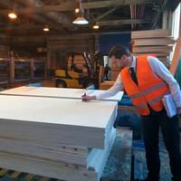 GTT's auditor signs of plywood samples for qualification tests. (Photo: Sveza)