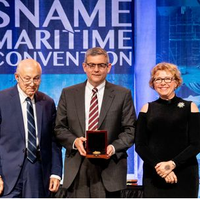 HII President and CEO Mike Petters, center, accepts the 2019 Vice Admiral Emory S. “Jerry” Land Medal from, at left, Fred Harris, former president of General Dynamics NASSCO and Bath Iron Works, and Suzanne Beckstoffer, president of Society of Naval Architect and Marine Engineers (SNAME). The Land Medal is presented to an individual for outstanding accomplishment in the marine field. Photo courtesy of SNAME