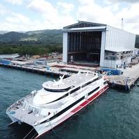 Hull 680 in front of the new 120 metre assembly bay at Austal Philippines shipyard in Balamban, Cebu (Image: Austal)